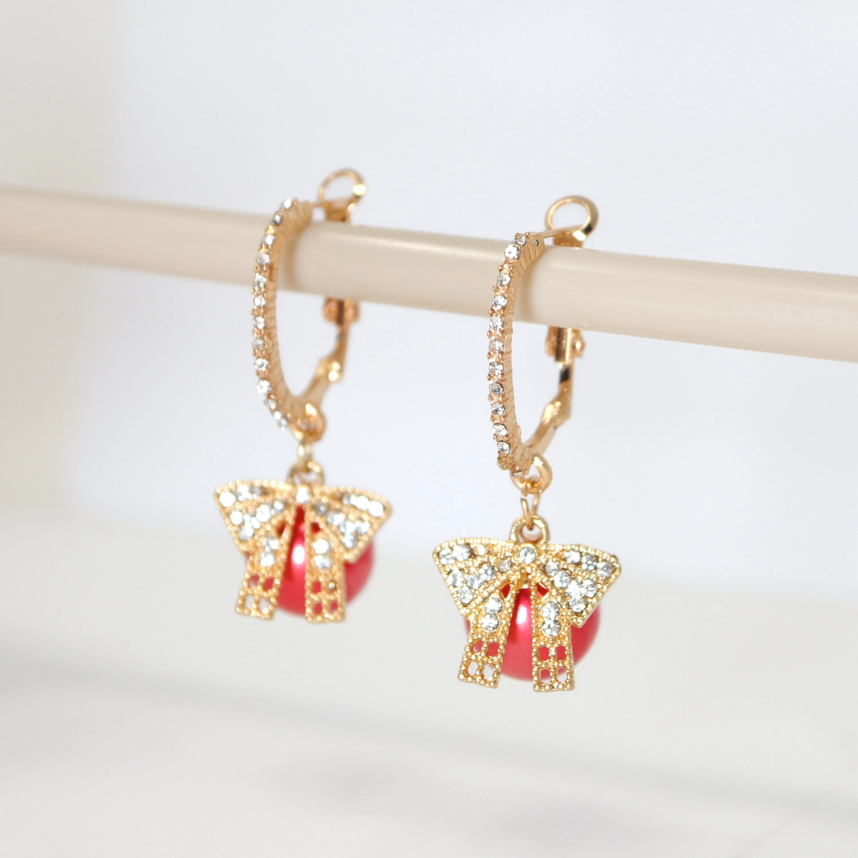 Golden Holiday Bow Red Drop Christmas Themed earrings, Red Gold Christmas Earrings Statement Christmas earrings.